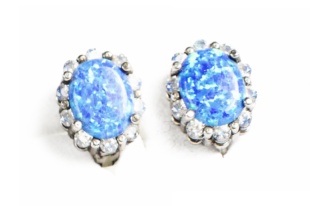 Juego de aretes piedra azul y blanco